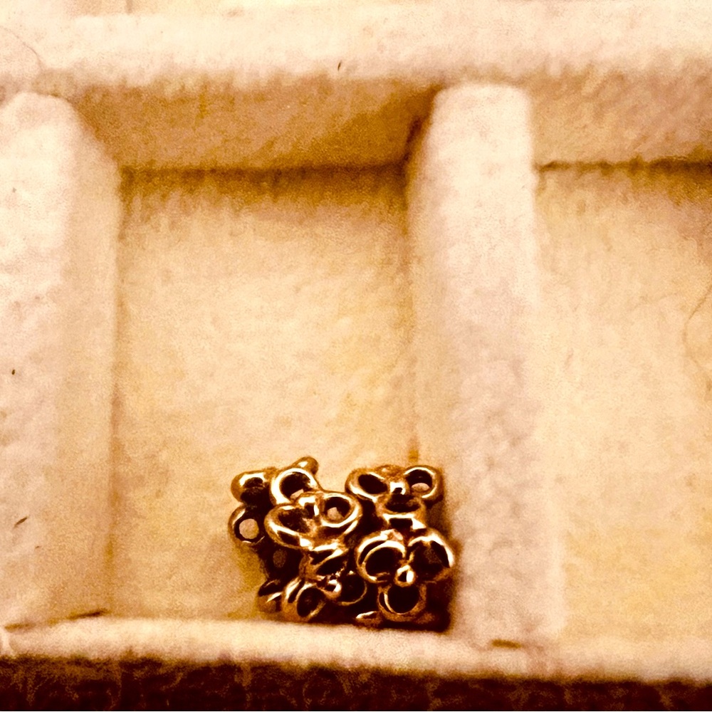 2 Pandora 14k gold flower spacer. Retired.